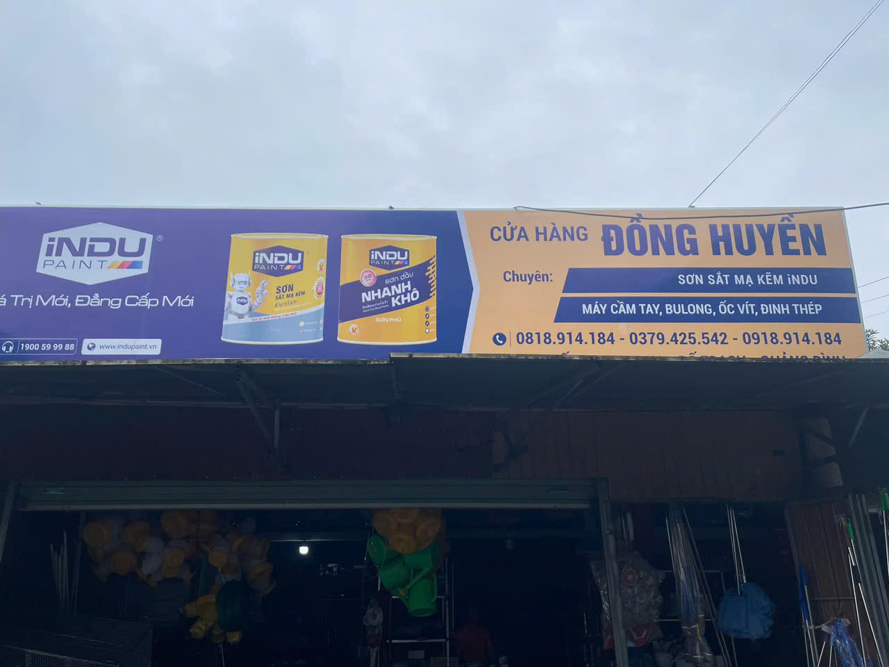 Thi công bảng hiệu cho hẵng sơn iNDU tại phong nha quảng bình